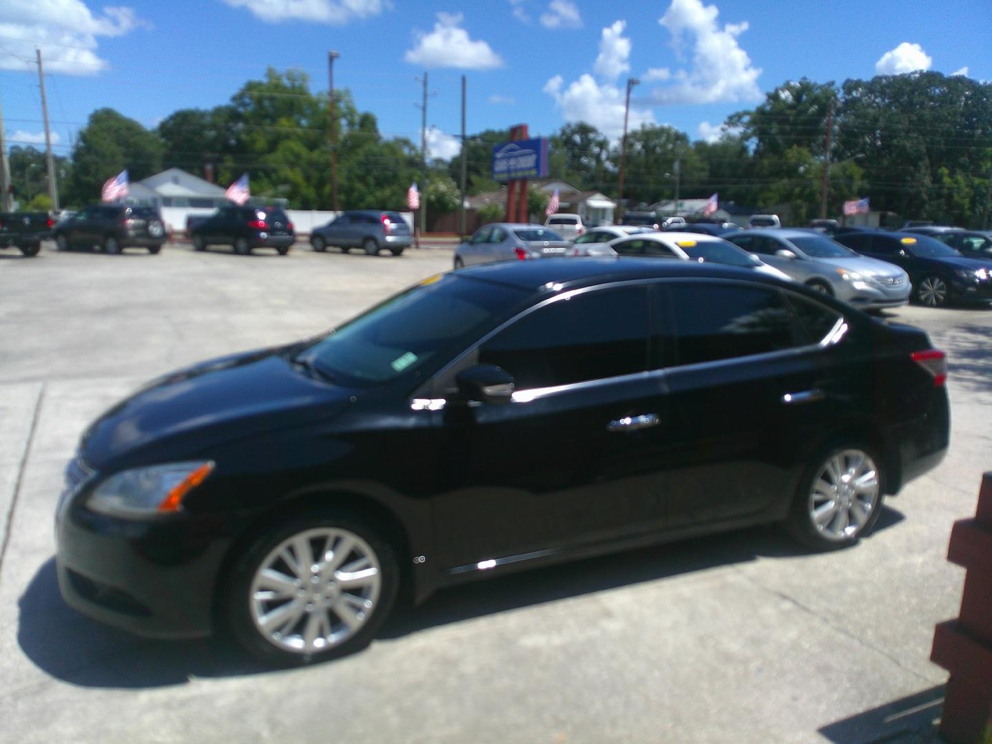 2015 BLACK NISSAN SENTRA SR; S; SL; SV (3N1AB7APXFY) , located at 1200 Cassat Avenue, Jacksonville, FL, 32205, (904) 695-1885, 30.302404, -81.731033 - Photo#1